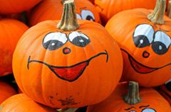 Fall pumpkins decorated for Halloween